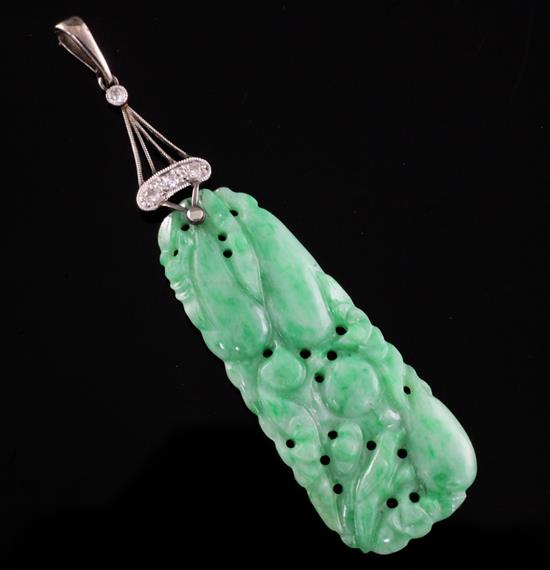 A Chinese jadeite and diamond mounted pendant, total length 5.7cm